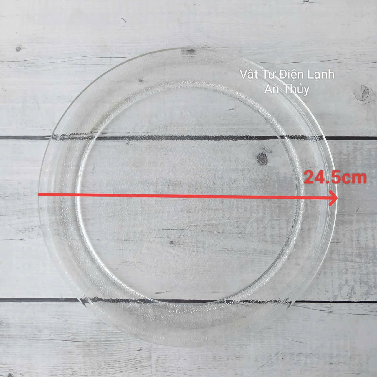 Đĩa thuỷ tinh lò vi sóng đường kính 24.5cm loại không vấu Đĩa thuỷ tinh lò vi sóng đường kính 24.5cm loại không vấu