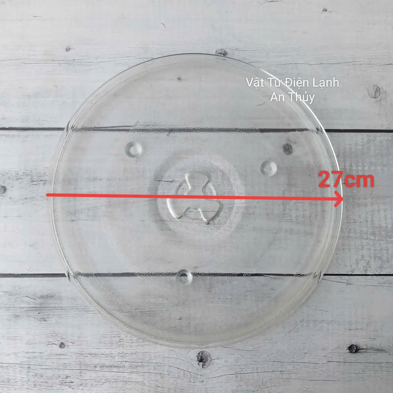 Đĩa thuỷ tinh lò vi sóng đường kính 27cm có vấu Đĩa thuỷ tinh lò vi sóng đường kính 27cm có vấu