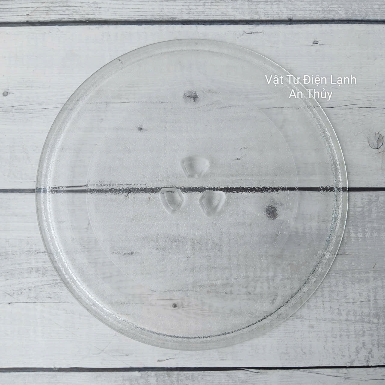 Đĩa thuỷ tinh lò vi sóng đường kính 24.5cm có vấu Đĩa thuỷ tinh lò vi sóng đường kính 24.5cm có vấu