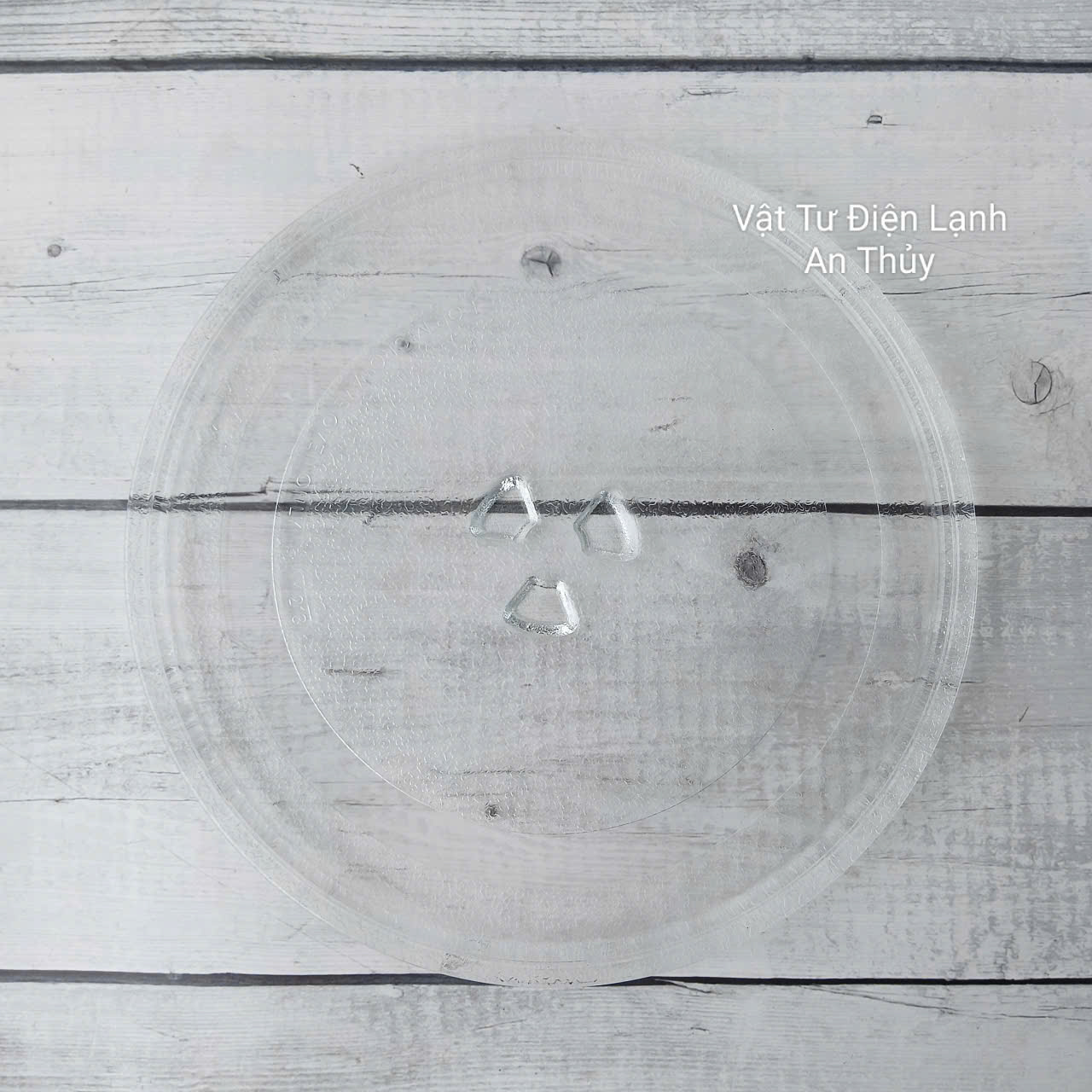 Đĩa thuỷ tinh lò vi sóng đường kính 24.5cm có vấu Đĩa thuỷ tinh lò vi sóng đường kính 24.5cm có vấu