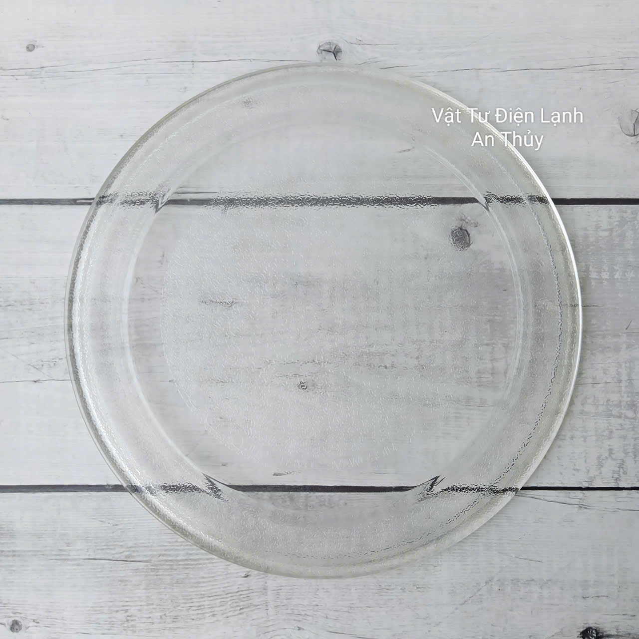 Đĩa thuỷ tinh lò vi sóng đường kính 24.5cm loại không vấu Đĩa thuỷ tinh lò vi sóng đường kính 24.5cm loại không vấu