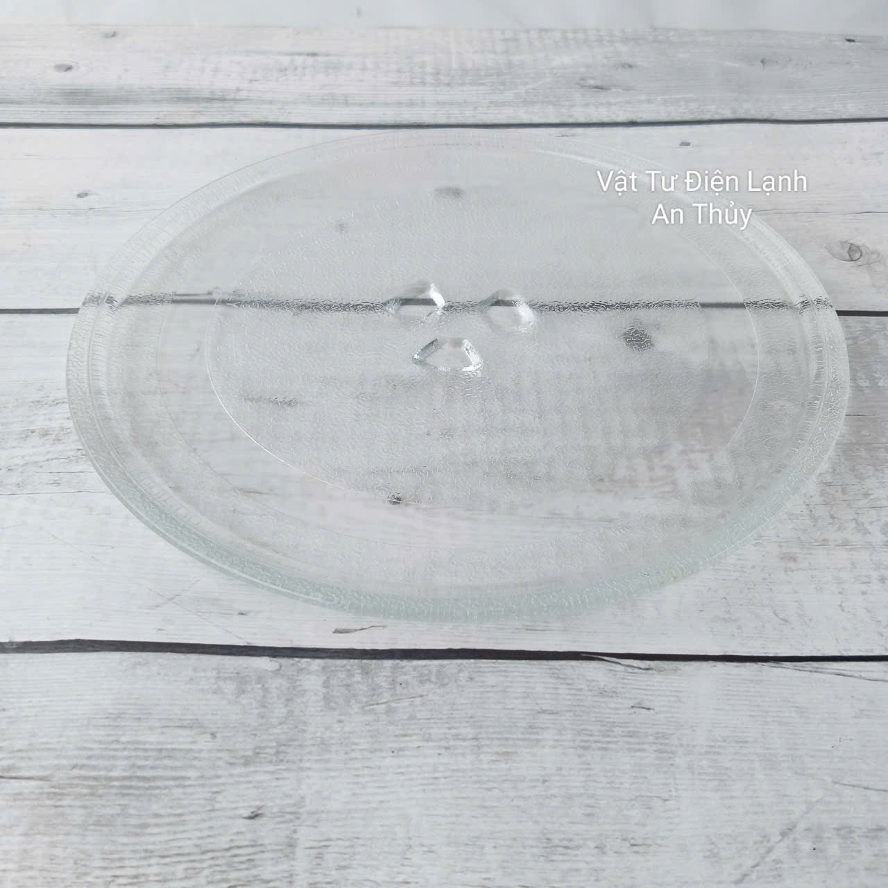 Đĩa thuỷ tinh lò vi sóng đường kính 24.5cm có vấu Đĩa thuỷ tinh lò vi sóng đường kính 24.5cm có vấu